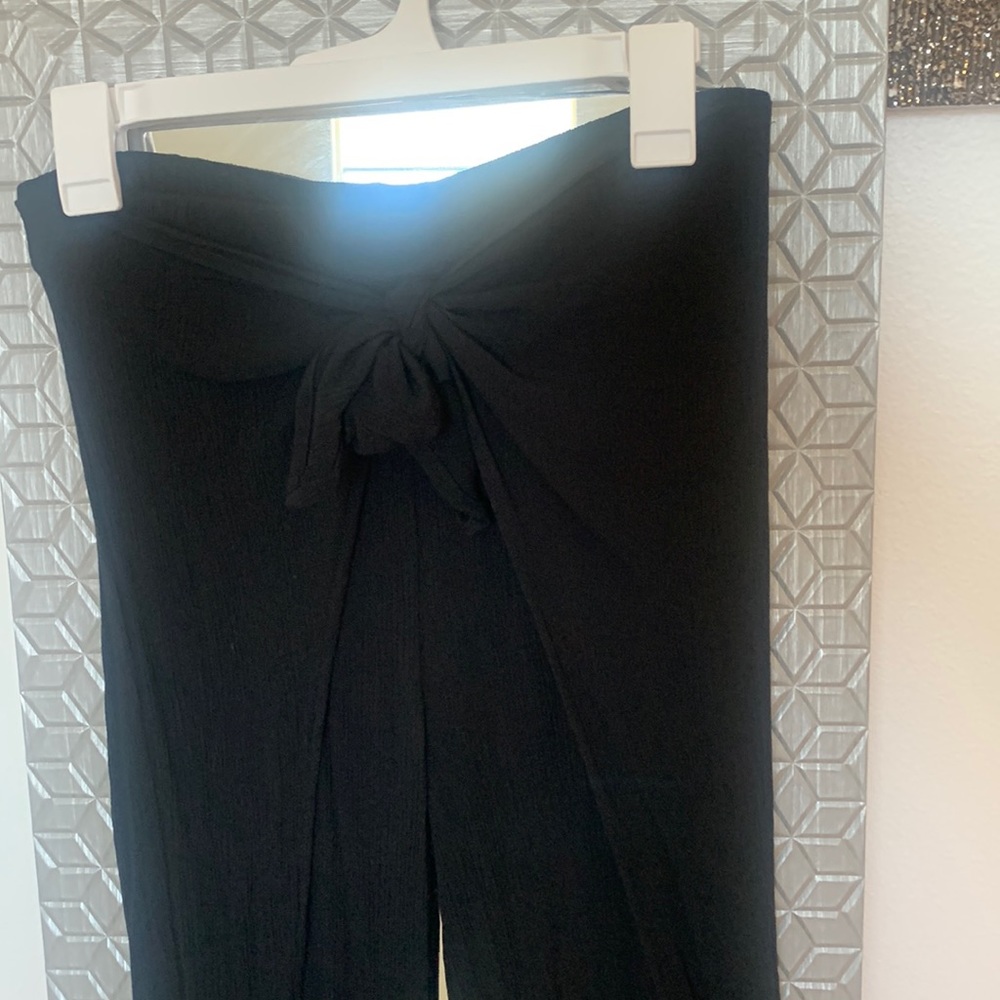Women’s black swim suit cover up pants. Size Medium
